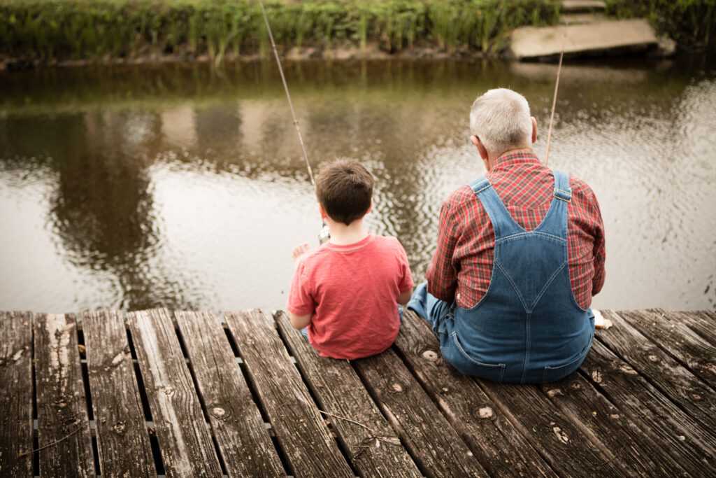 grandfather and grandson fishing together wealth transfer HFG Trust