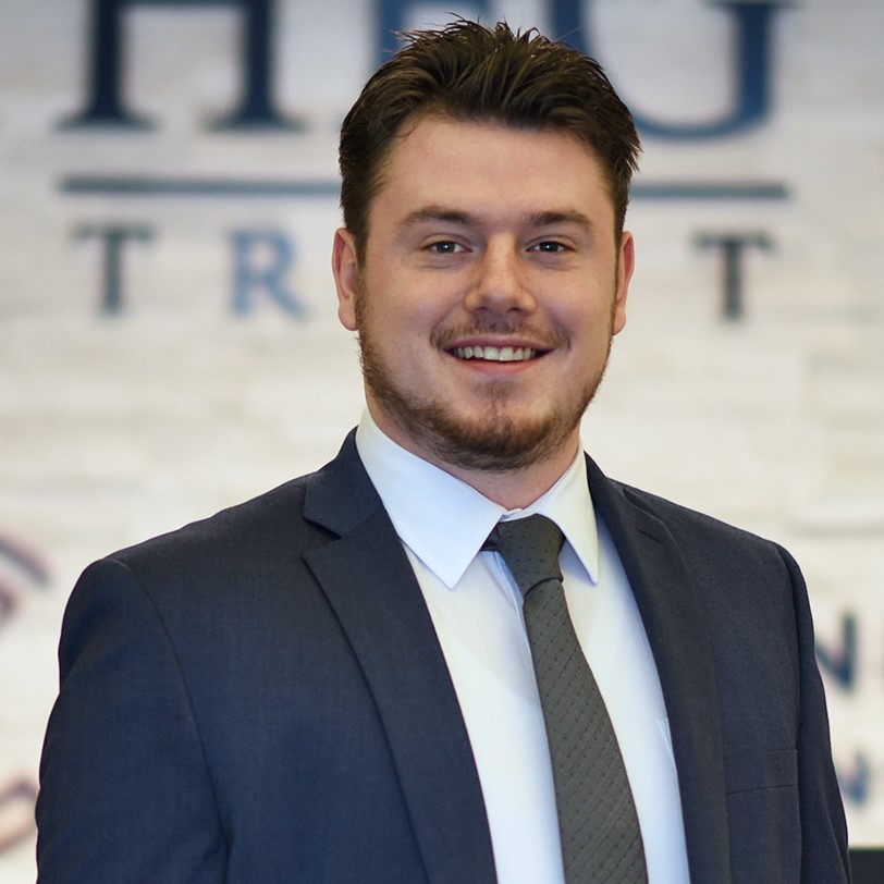Tyler Pearson, Wealth Planner at HFG Trust and a member of the 401k team